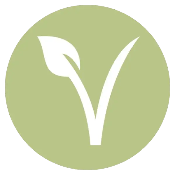 A minimalist white leaf icon set against a solid sage green circular background.